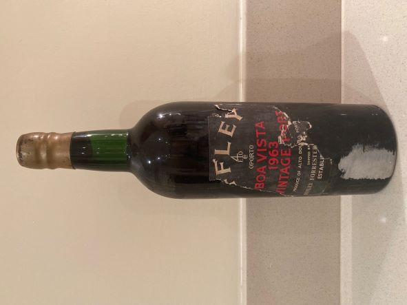 The bottle with the battered label