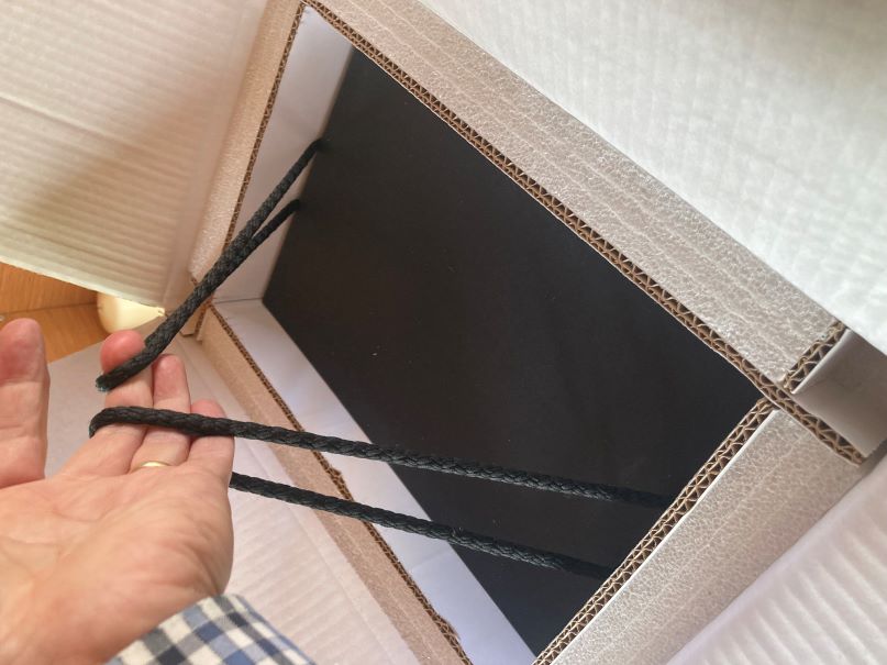 The next box has string handles