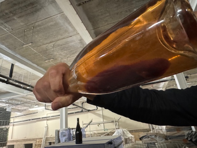 The lees in a bottle