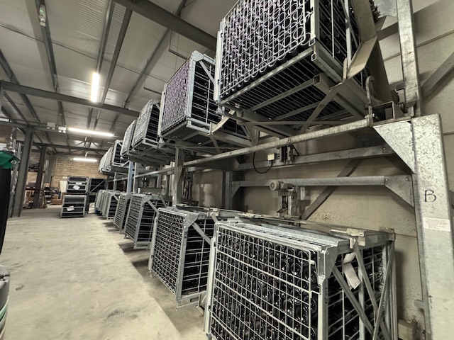 Gyro-pallets gradually tipping the lees into the neck of the bottle