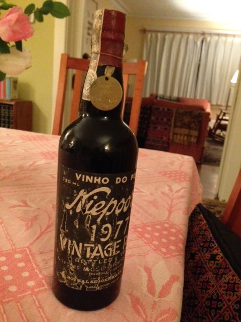I have asked my friend, in whose wine cellar this port is stored, to take a photo of the level of the wine in the bottle.